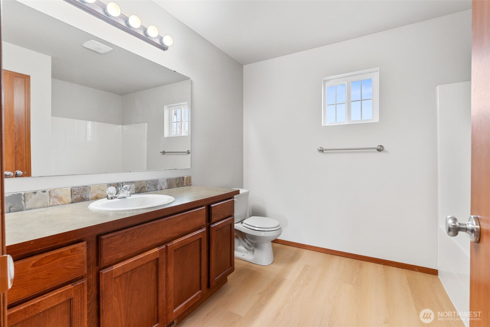 116 Goldmyer Drive Chehalis, WA 98532 - Photo 29 of 38 a bathroom with a toilet a sink and a mirror