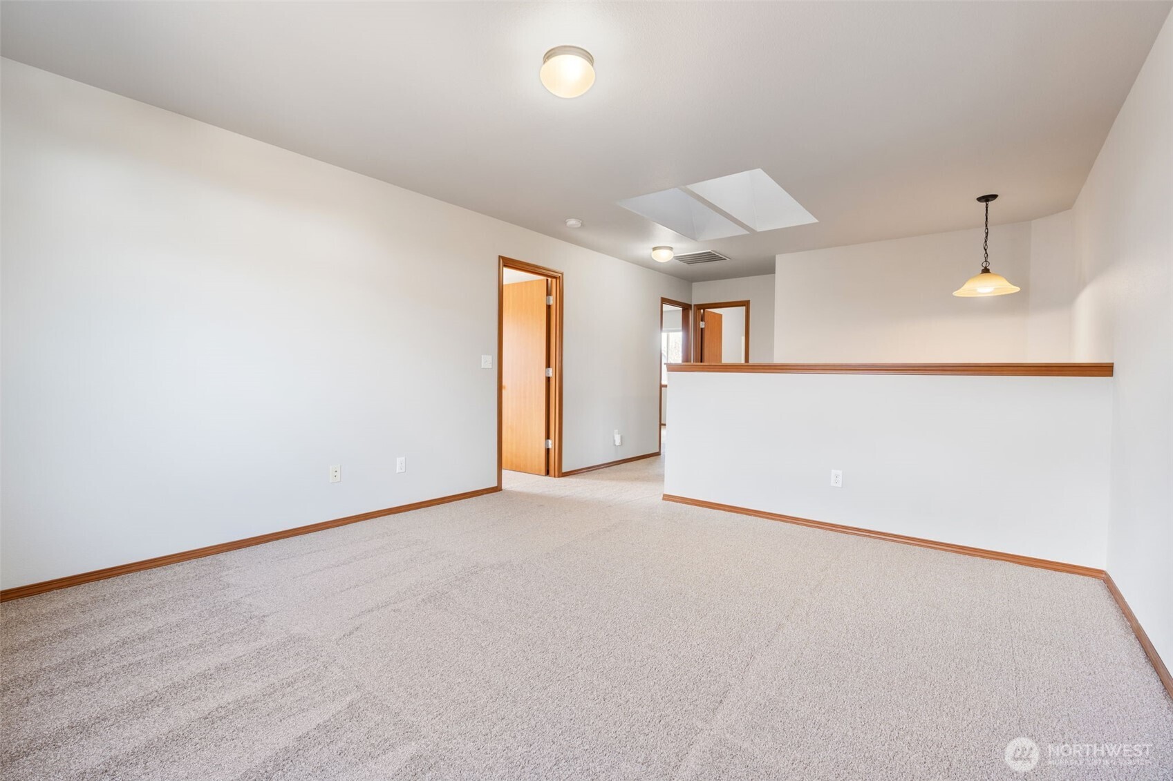 116 Goldmyer Drive Chehalis, WA 98532 - Photo 33 of 38 an empty room with windows and chandelier fan