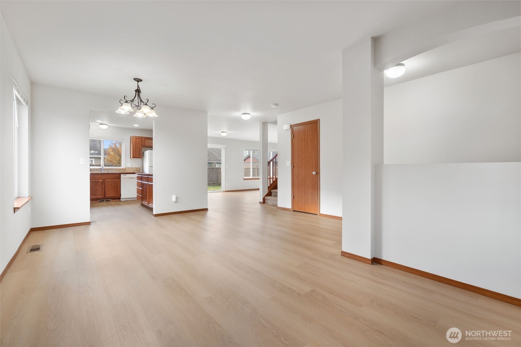 116 Goldmyer Drive Chehalis, WA 98532 - Photo 8 of 38 a view of a big room with wooden floor and a kitchen