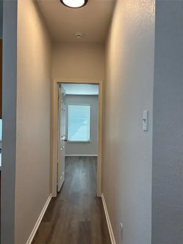 a view of a room that has a window in it