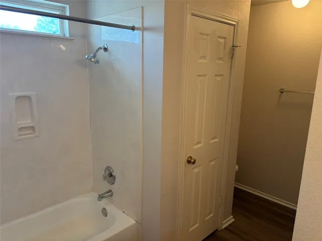 a bathroom with a bathtub