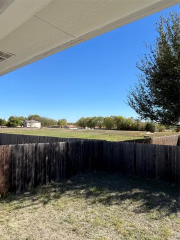 a view of wooden fence
