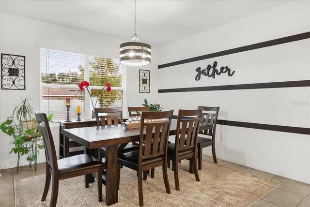 a view of a dining room with furniture