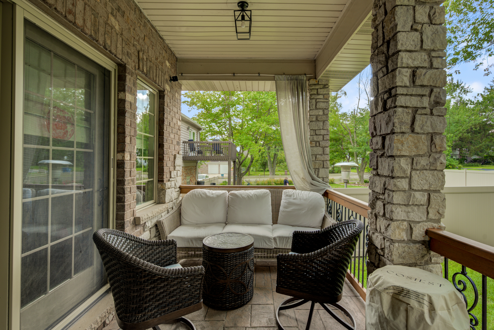 4436 Roslyn Road Downers Grove, IL 60515 - Photo 13 of 30 a outdoor living space with furniture and a potted plant