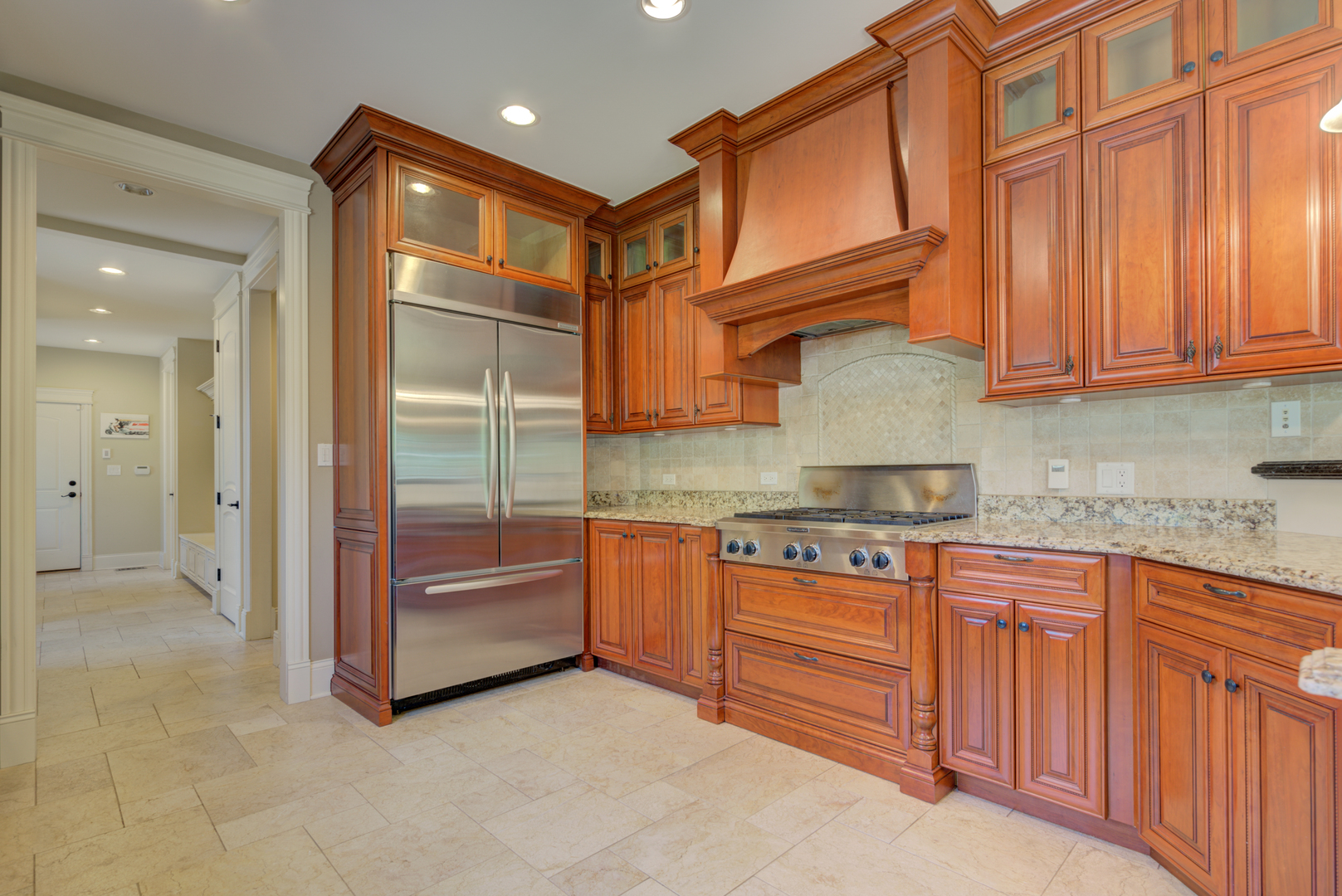 4436 Roslyn Road Downers Grove, IL 60515 - Photo 7 of 30 a kitchen with granite countertop stainless steel appliances and cabinets