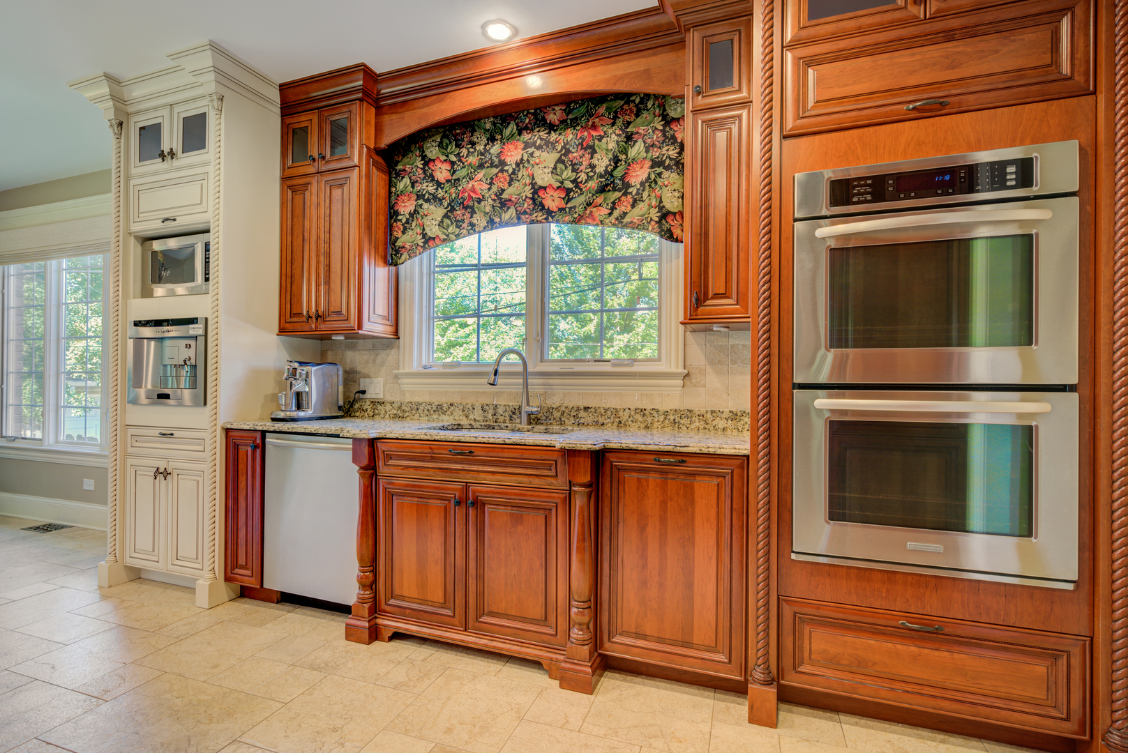 4436 Roslyn Road Downers Grove, IL 60515 - Photo 8 of 30 a kitchen with stainless steel appliances granite countertop cabinets and a stove top oven