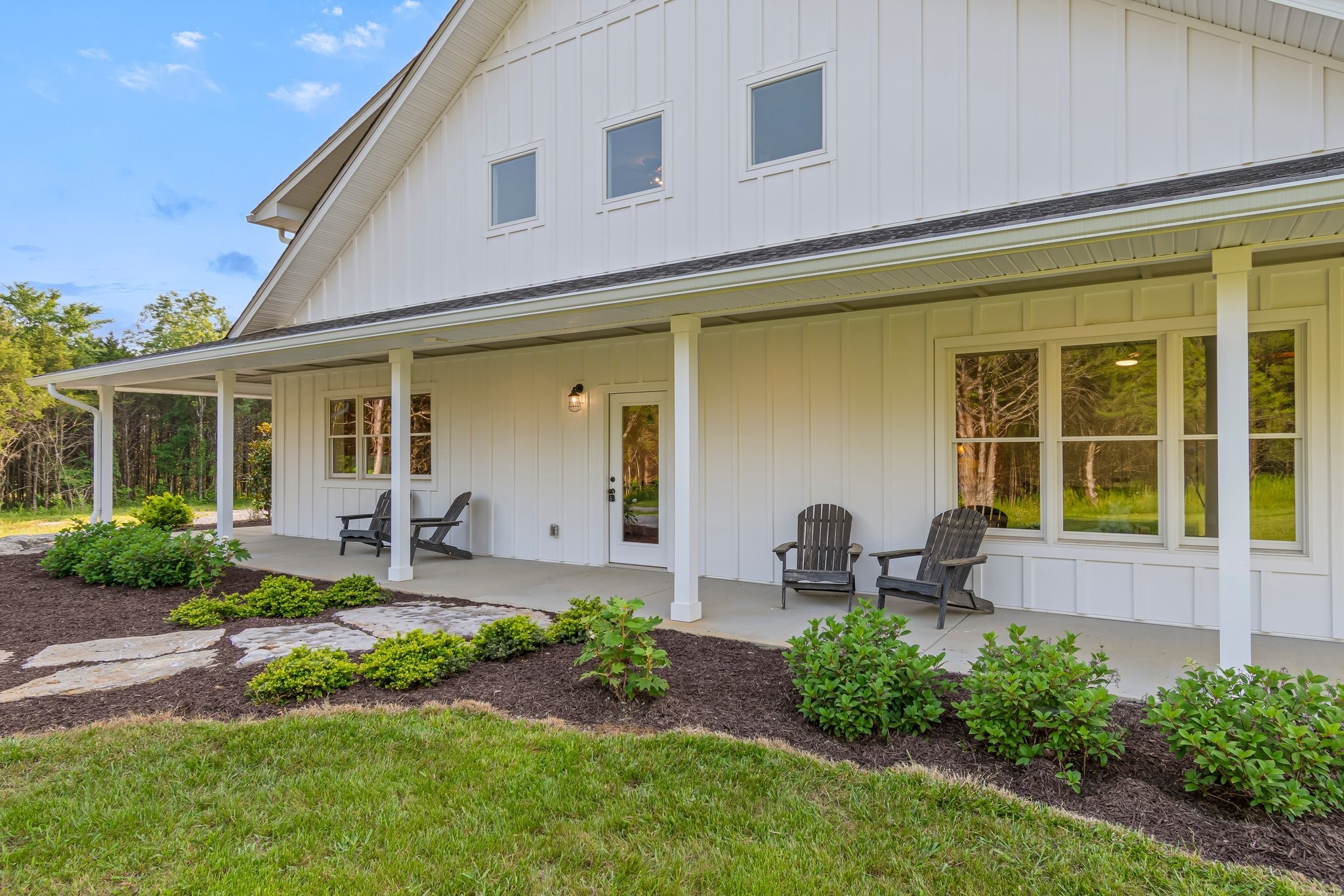 2825 Oregon Road Milton, TN 37118 - Photo 11 of 71 a front view of a house with garden and porch