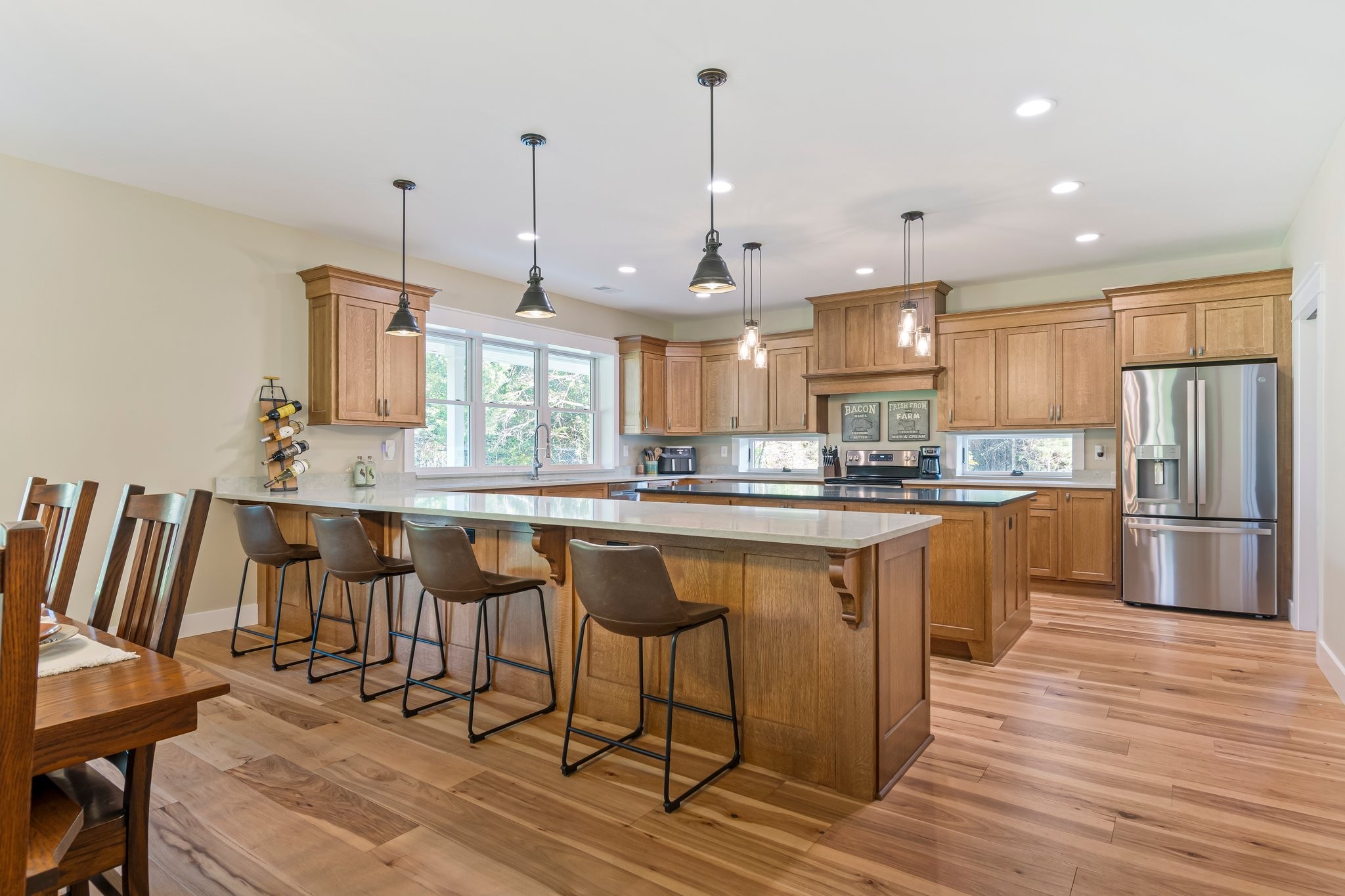 2825 Oregon Road Milton, TN 37118 - Photo 13 of 71 a kitchen with stainless steel appliances granite countertop a sink a stove a refrigerator and island with wooden floor