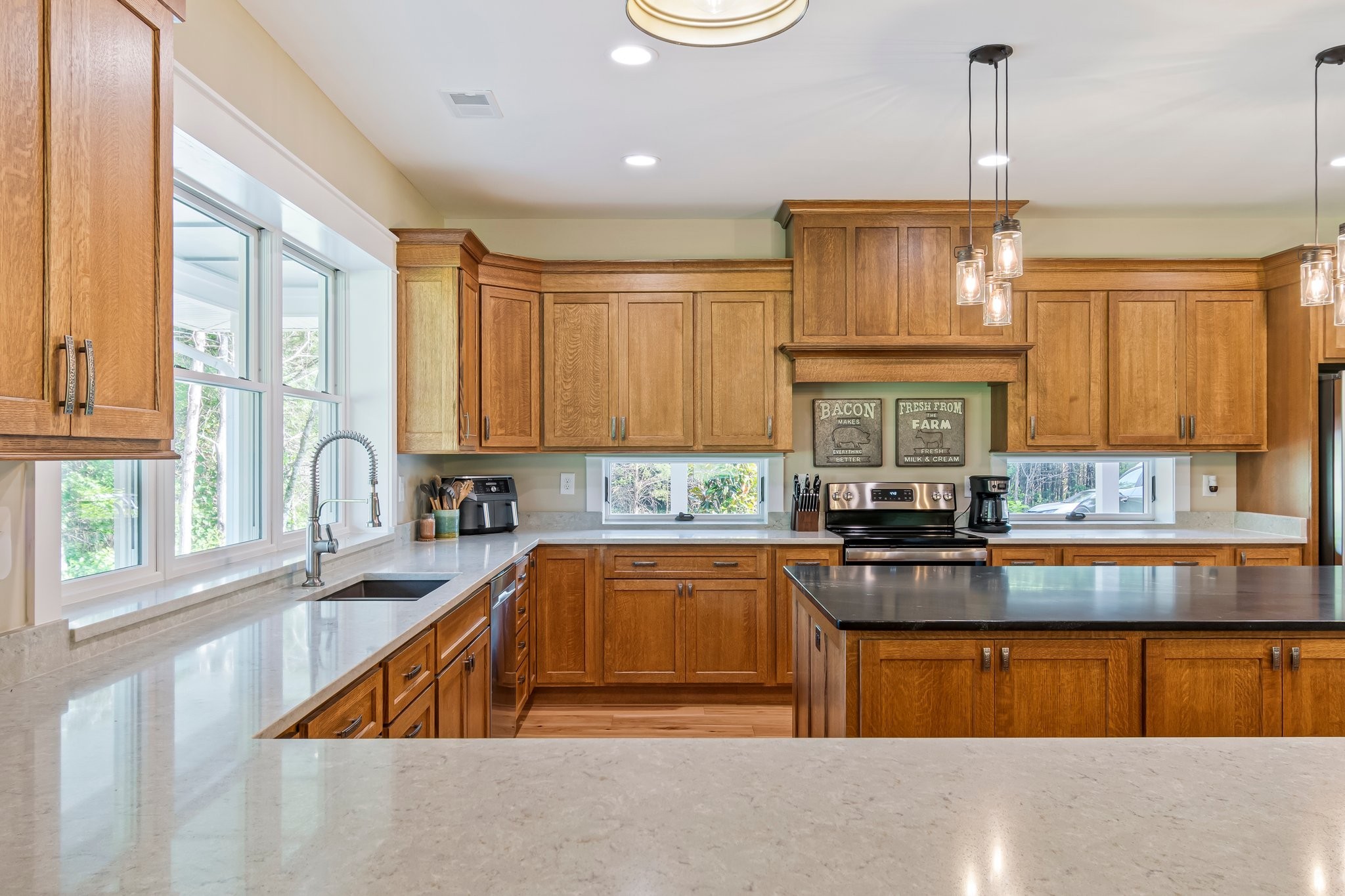 2825 Oregon Road Milton, TN 37118 - Photo 15 of 71 a kitchen with stainless steel appliances granite countertop a sink a stove and a wooden cabinets