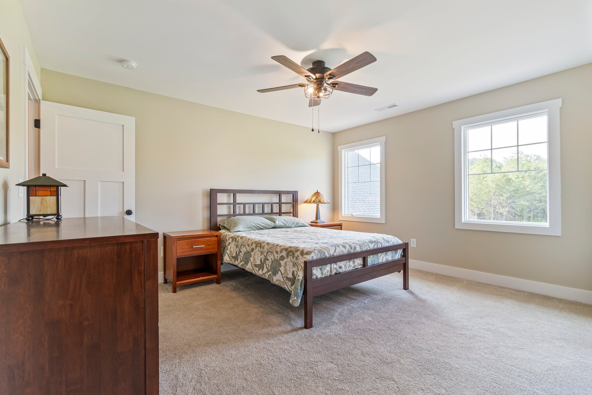 2825 Oregon Road Milton, TN 37118 - Photo 32 of 71 a bed sitting in a bedroom next to a window