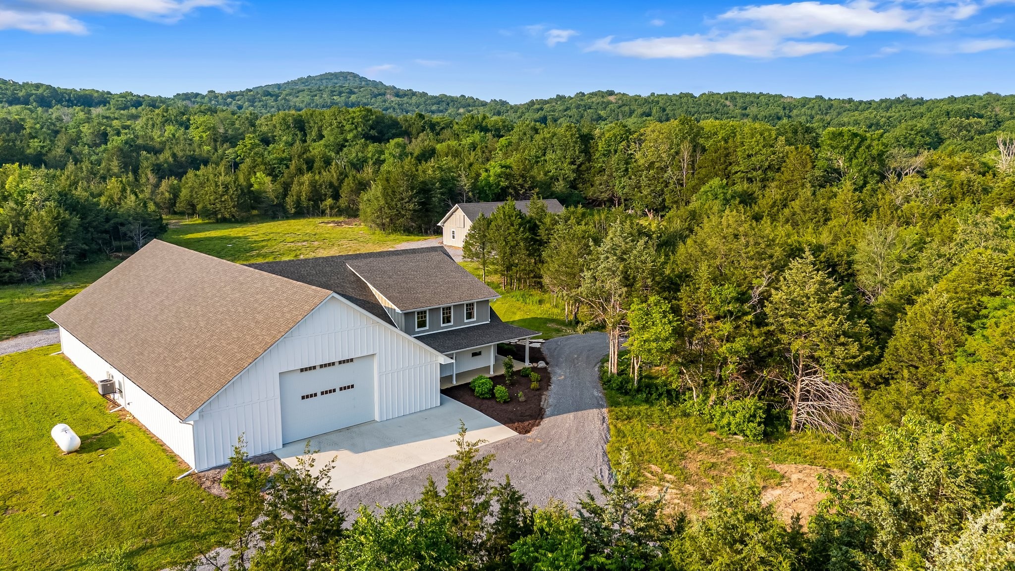 2825 Oregon Road Milton, TN 37118 - Photo 70 of 71 an aerial view of a house with a yard