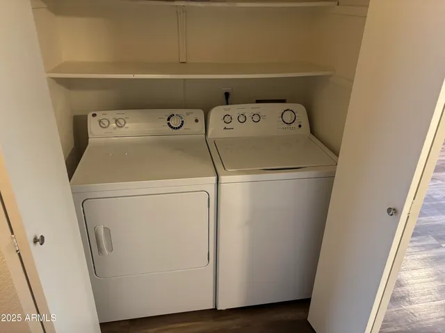 a utility room with dryer and washer