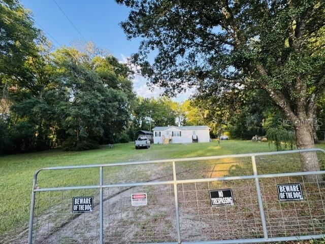 11817 Southwest 58th Street Webster, FL 33597 - Photo 45 of 46 a view of a tennis court