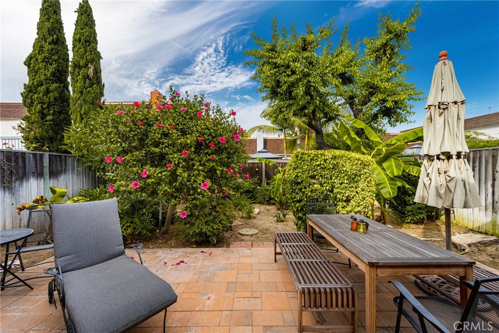 96 Seton Road Irvine, CA 92612 - Photo 14 of 35 a wooden bench sitting in backside of a house