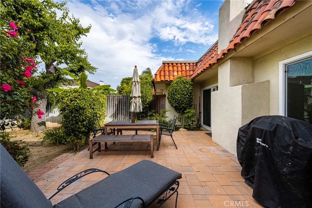 96 Seton Road Irvine, CA 92612 - Photo 15 of 35 a backyard of a house with table and chairs