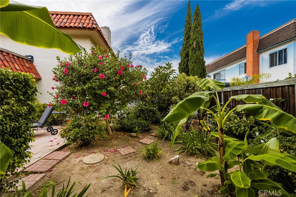 96 Seton Road Irvine, CA 92612 - Photo 17 of 35 a sign that is in front of flowers