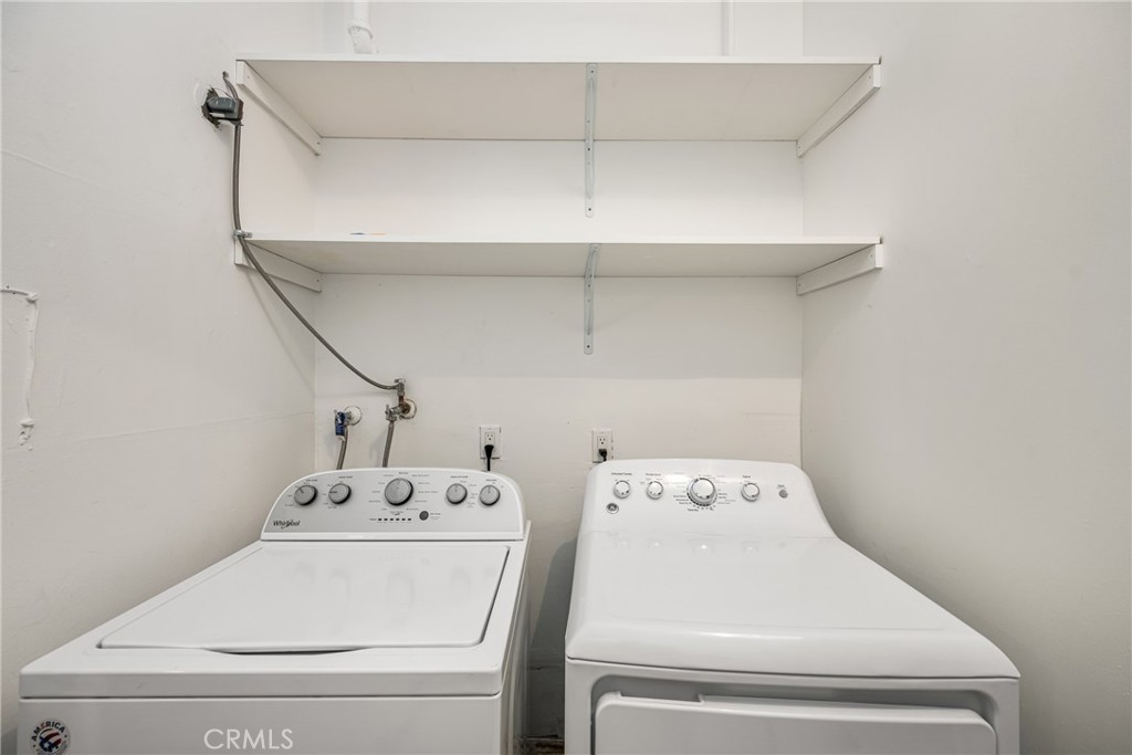 96 Seton Road Irvine, CA 92612 - Photo 22 of 35 a utility room with dryer and washer