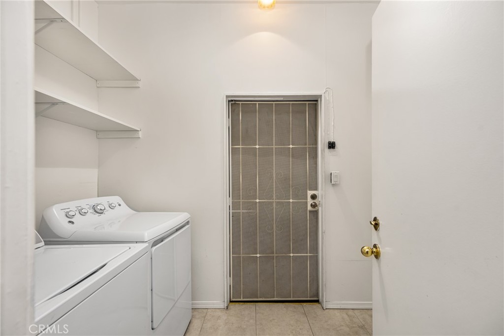 96 Seton Road Irvine, CA 92612 - Photo 23 of 35 a utility room with dryer and washer