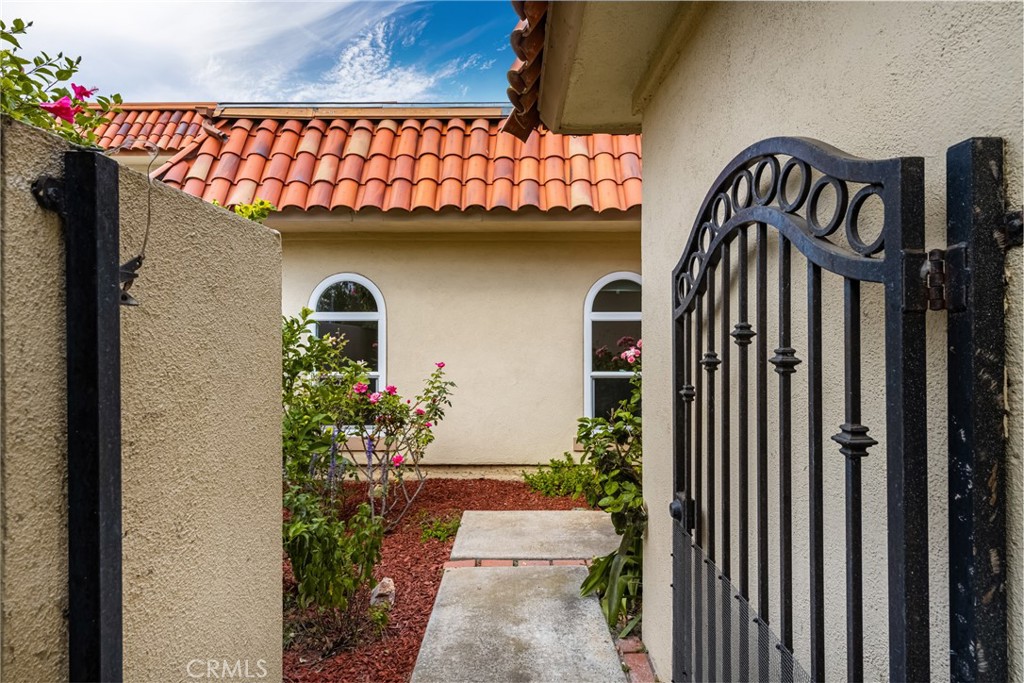 96 Seton Road Irvine, CA 92612 - Photo 4 of 35 a front view of a house with a porch