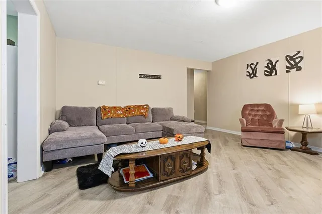 a living room with furniture and a couch