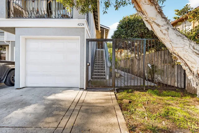 a view of a backyard with a small cabin