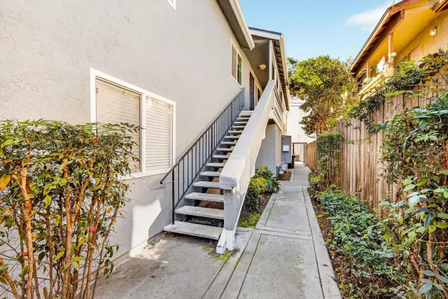 a view of entryway with flower plants