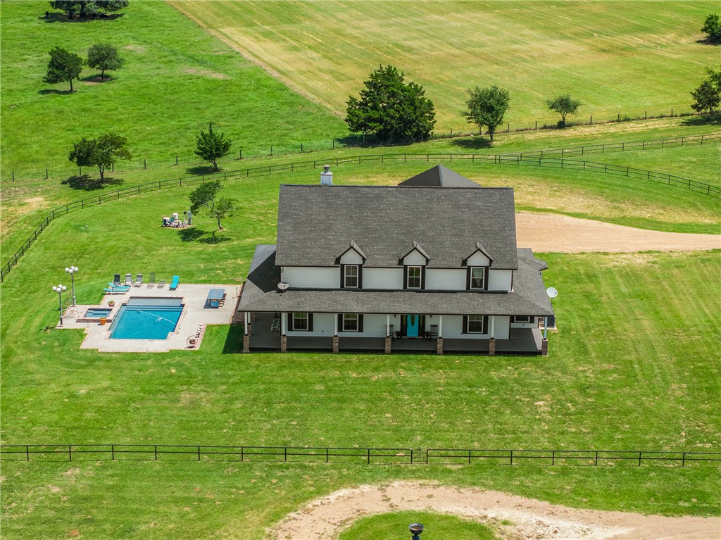 1725 Stokes Road New Ulm, TX 78950 - Photo 13 of 50 a view of a lake with a big yard
