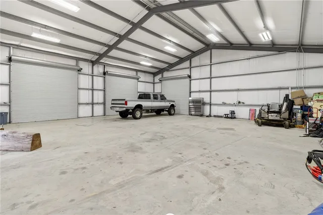 a view of large swimming pool and outdoor space