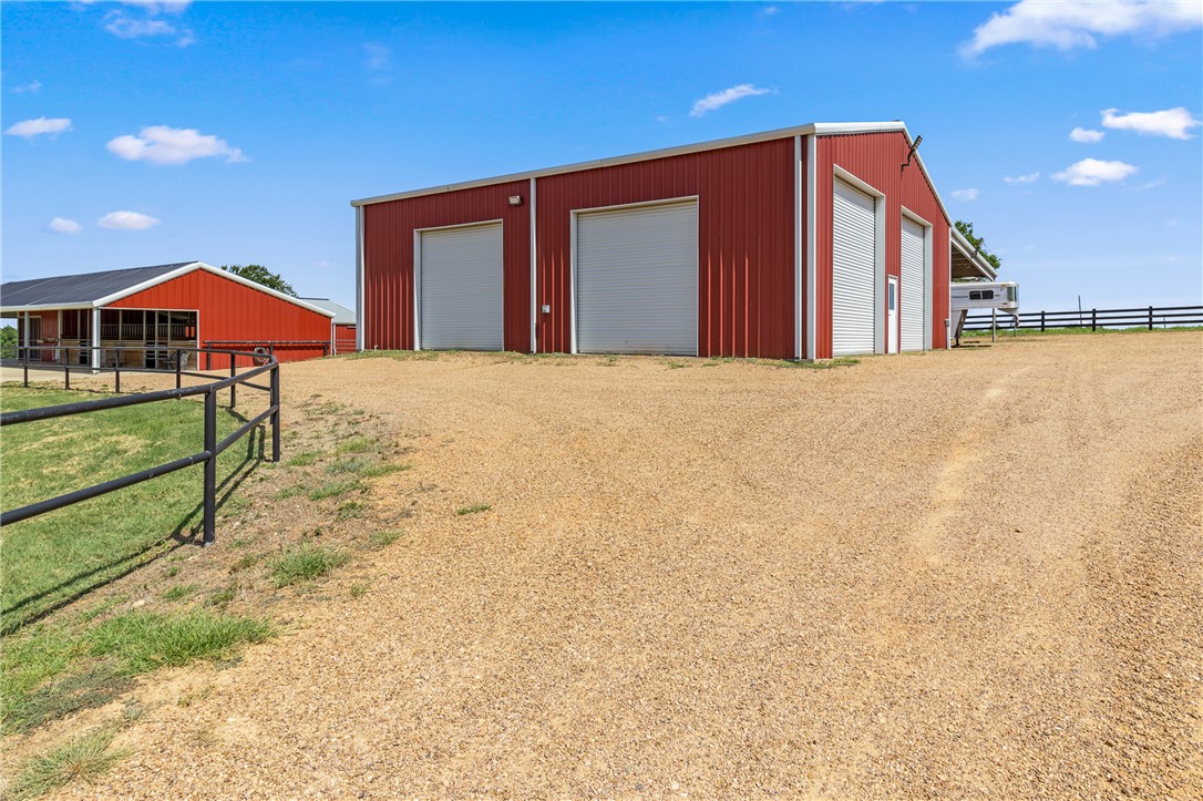 1725 Stokes Road New Ulm, TX 78950 - Photo 21 of 50 a view of a house with a yard