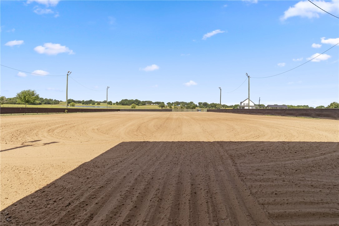 1725 Stokes Road New Ulm, TX 78950 - Photo 25 of 50 a view of a lake with a outdoor space