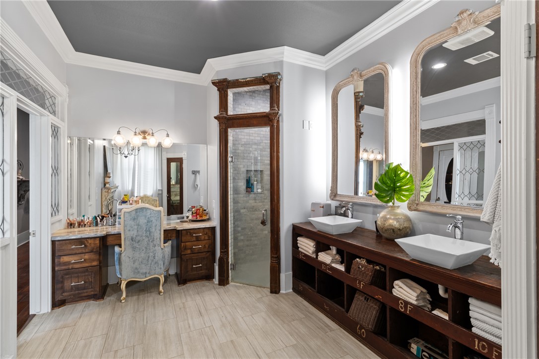 1725 Stokes Road New Ulm, TX 78950 - Photo 32 of 50 a view of bathroom with dual sinks