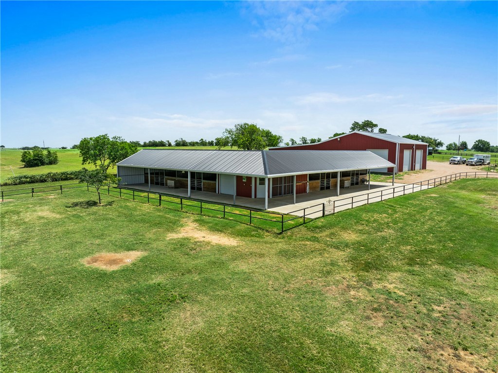 1725 Stokes Road New Ulm, TX 78950 - Photo 10 of 50 View of horse barn with a rural view