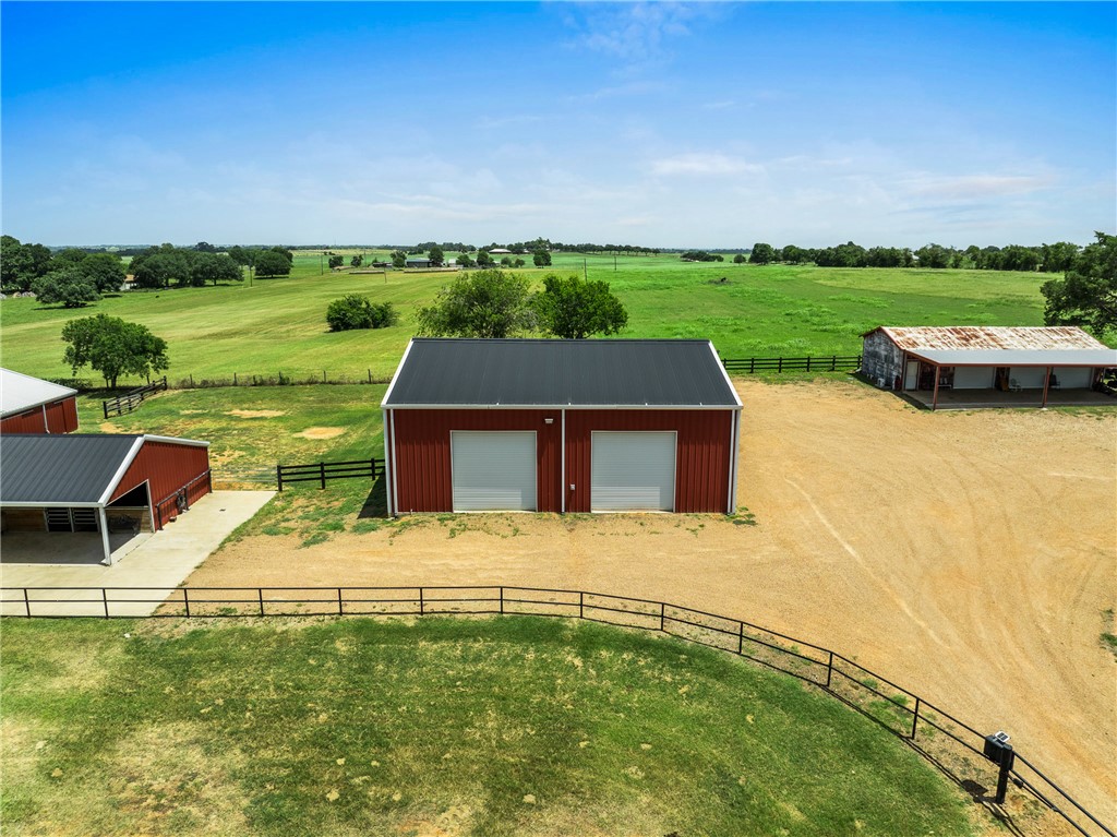 1725 Stokes Road New Ulm, TX 78950 - Photo 10 of 50 a front view of a house with a yard