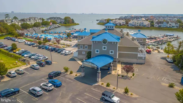 an aerial view of a pool patio swimming pool and outdoor seating