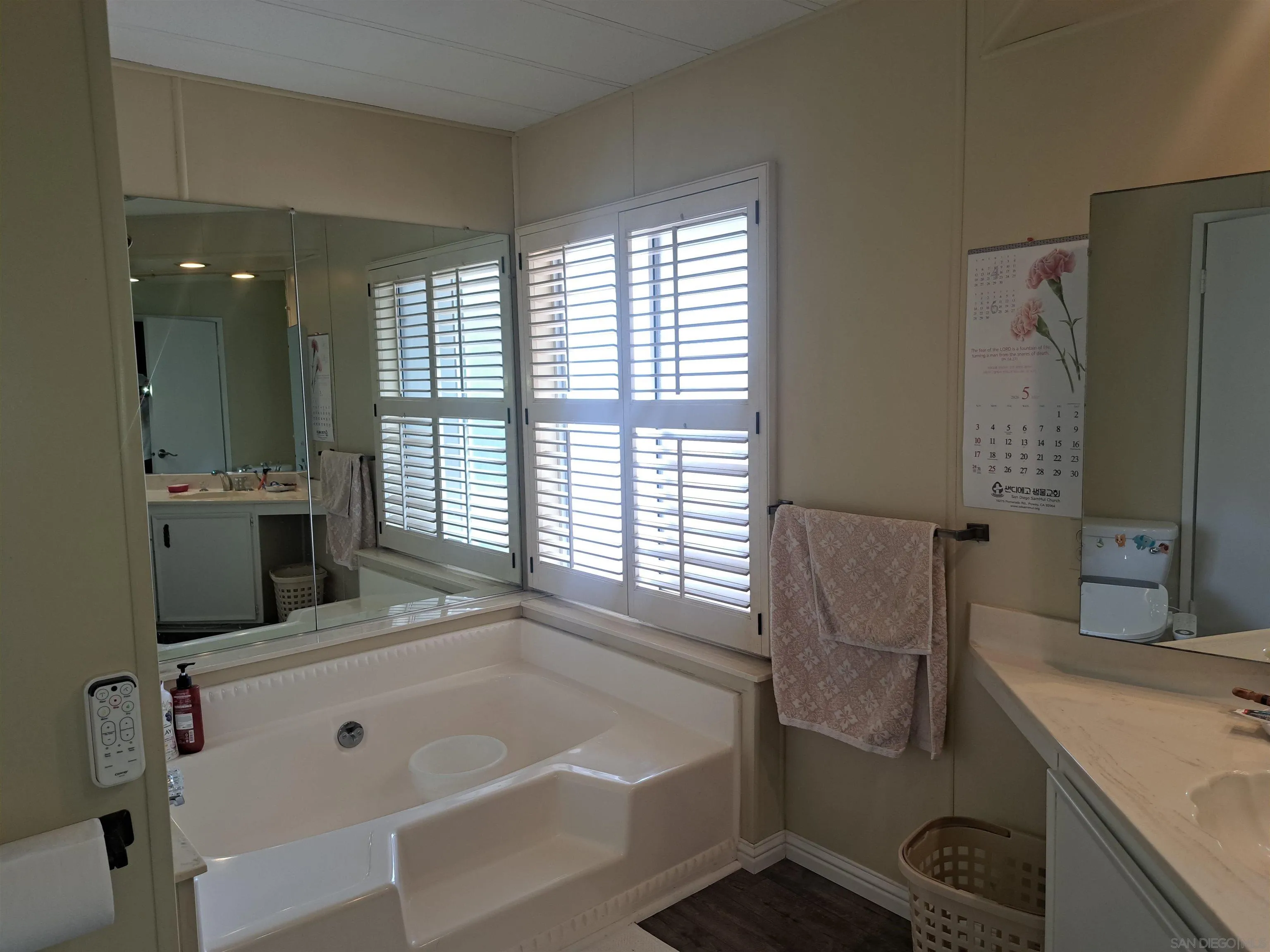 4650 Dulin Road, Unit 12 Fallbrook, CA 92003 - Photo 20 of 36 a bathroom with a bathtub and a sink