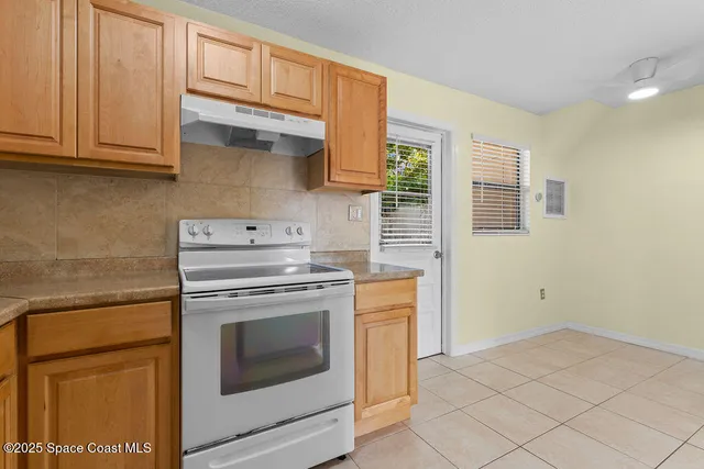 a view of an entryway with a window