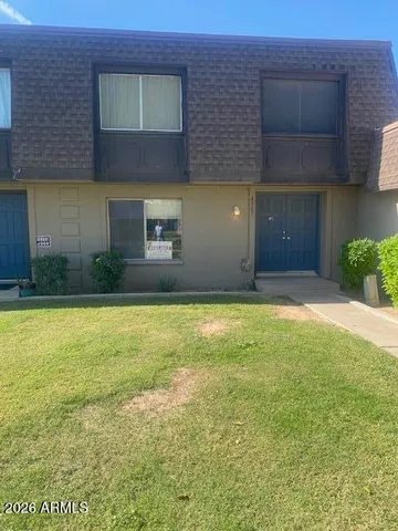 a front view of a house having yard