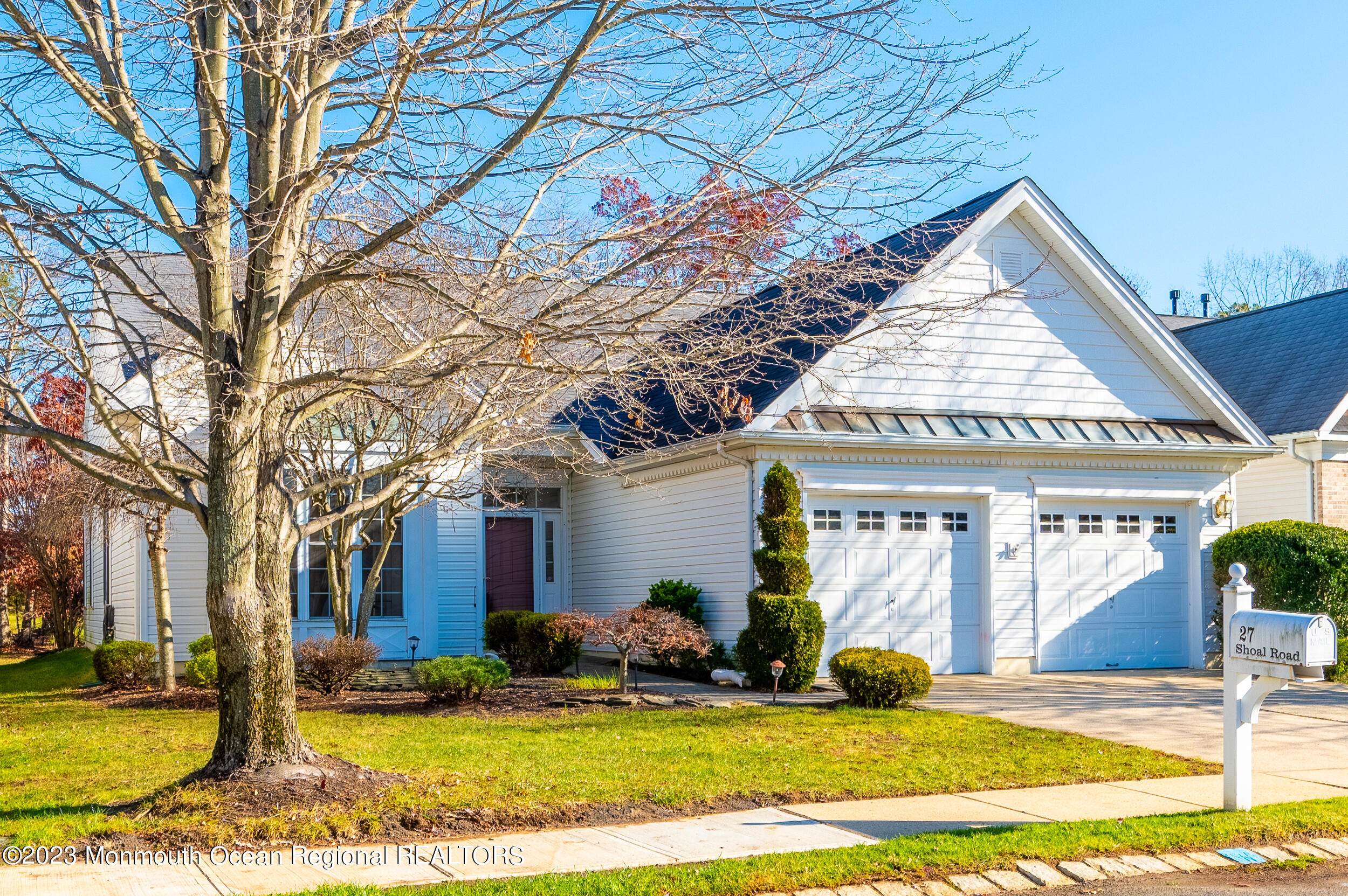 27 Shoal Road Jackson, NJ 08527 - Photo 2 of 42 a view of a house with a yard and garage