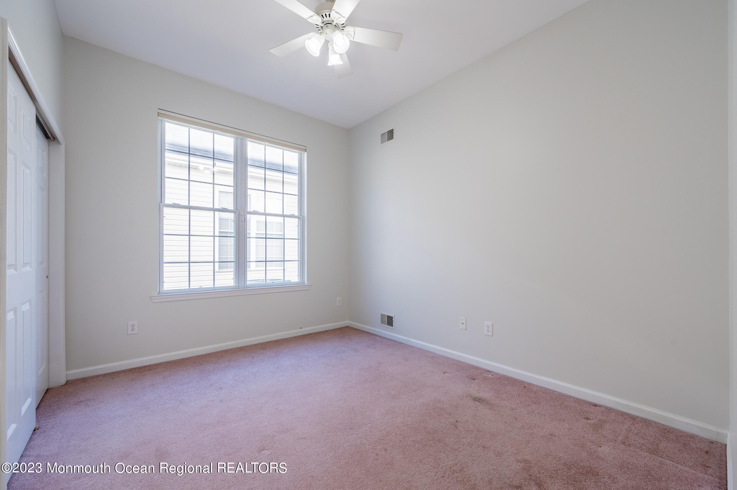 27 Shoal Road Jackson, NJ 08527 - Photo 29 of 42 an empty room with a window