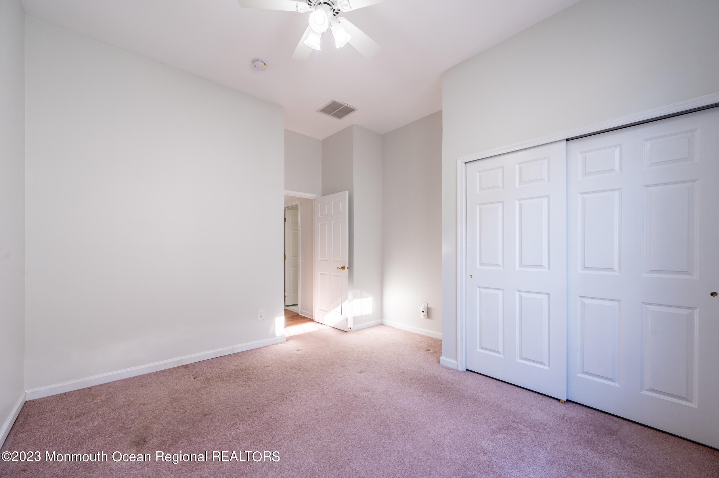 27 Shoal Road Jackson, NJ 08527 - Photo 30 of 42 an empty room with an entryway