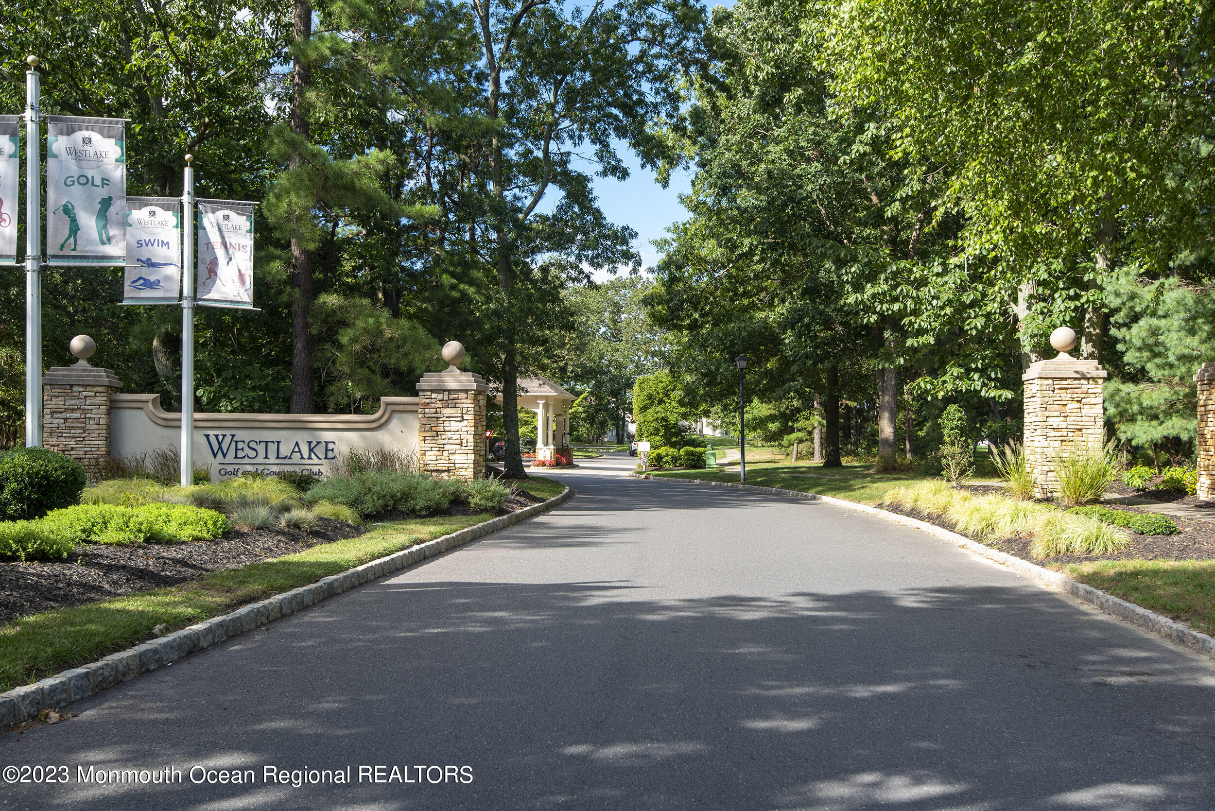 27 Shoal Road Jackson, NJ 08527 - Photo 38 of 42 a view of a street with houses on both side