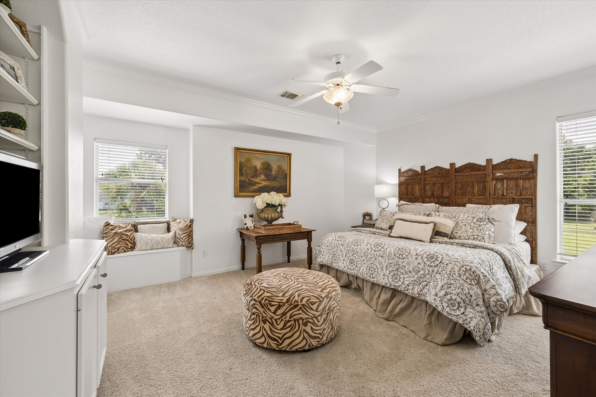 6819 Still Meadow Street Spring, TX 77389 - Photo 37 of 50 Spacious and serene, secondary bedroom number two overlooks the expansive backyard and features a charming window seat
