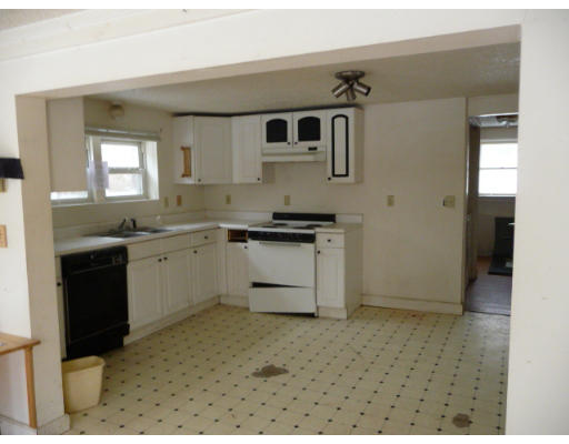 6 Boat House Road Groton, MA 01450 - Photo 3 of 9 a kitchen with a sink stove and cabinets