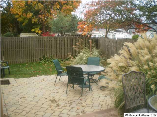 539 Woodland Avenue Brielle, NJ 08730 - Photo 16 of 20 a garden view with a seating space