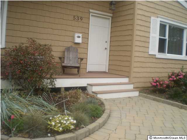 539 Woodland Avenue Brielle, NJ 08730 - Photo 20 of 20 a view of a entryway door of the house