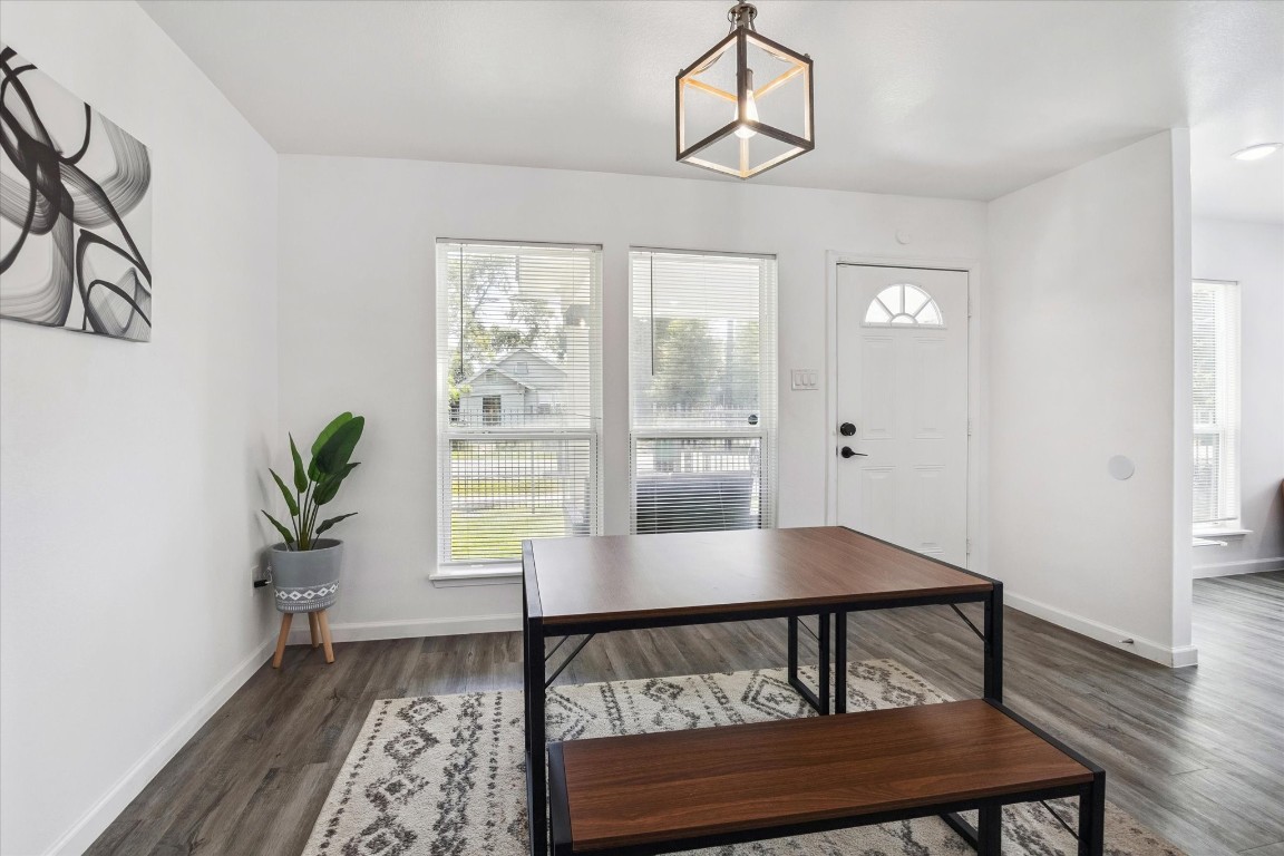2631 Stevens Street Houston, TX 77026 - Photo 4 of 25 a view of room with furniture and wooden floor