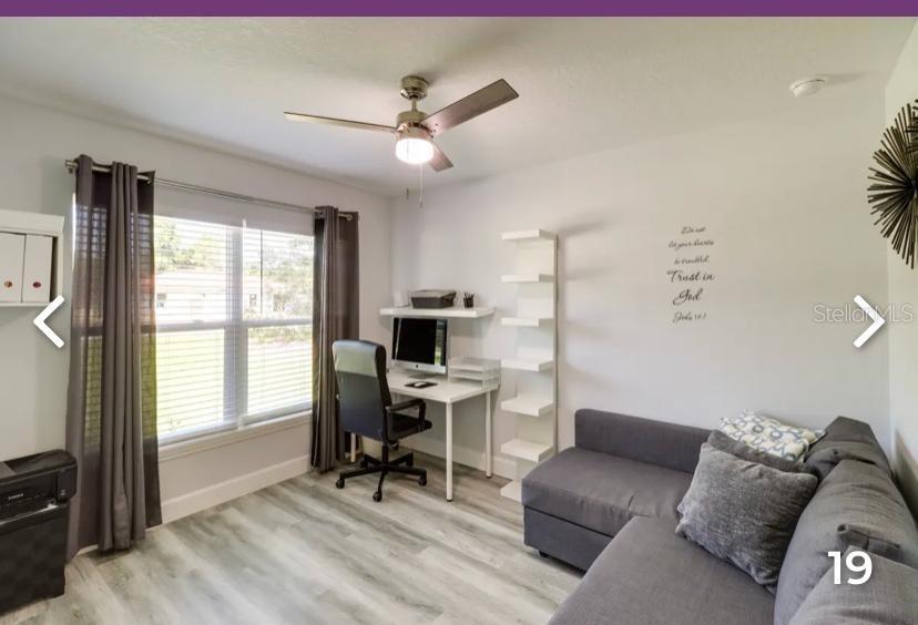 2081 Southwest 153rd Loop Ocala, FL 34473 - Photo 15 of 20 a living room with furniture and a window