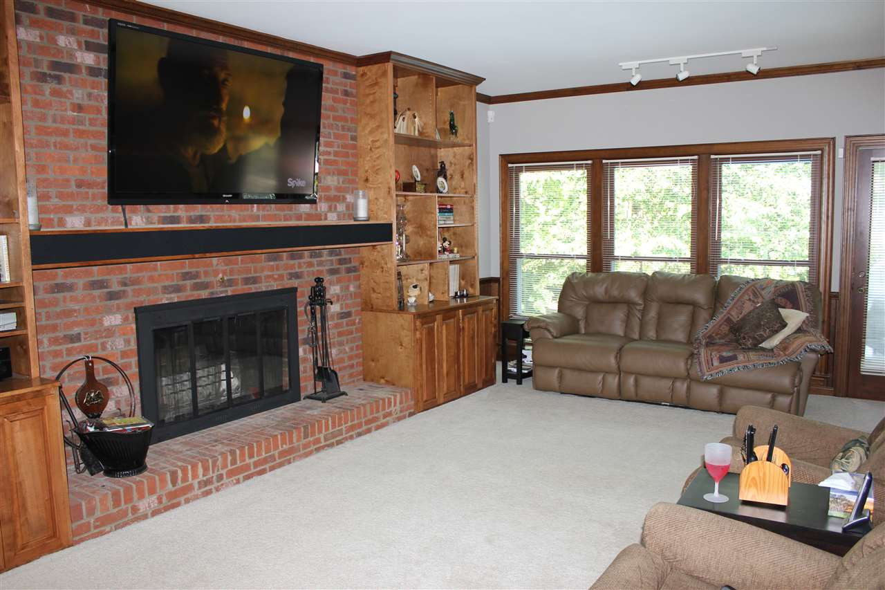 9504 Springdale Drive Raleigh, NC 27613 - Photo 4 of 25 Built-ins in Living Room