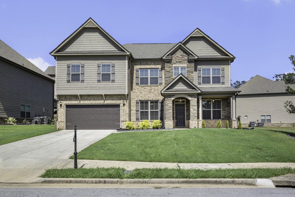 4845 Ralin Court Southwest Atlanta, GA 30331 - Photo 1 of 1 a front view of a house with a yard