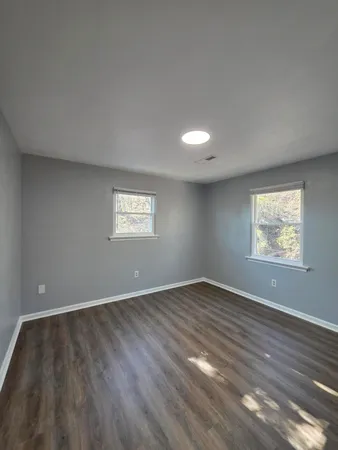 a view of an empty room and window